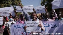 Sudanese journalist protest in Khartoum, Sudan, Tuesday, Nov.16, 2021. The placard in the middle reads: free press will remain, tyrants are fleeting (AP Photo/Marwan Ali)