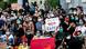 Protesters holding signs saying 'don't rape' Protesters holding signs saying 'don't rape'