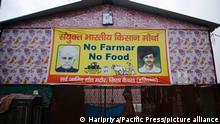 Indiens Premier zieht Agrarreform zurück