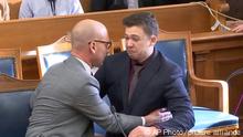 Kyle Rittenhouse is comforted by his lawyer as he was acquitted of all charges at the Kenosha County Courthouse in Kenosha, Wis., on Friday, Nov. 19, 2021. The jury came back with its verdict after close to 3 1/2 days of deliberation. (AP Photo)