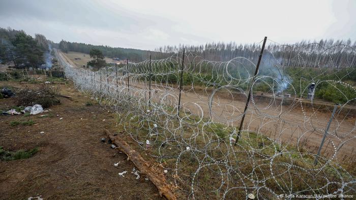 A view of barbed wires near Bruzgi checkpoint as irregular migrants continue to wait at the Polish-Belarusian border