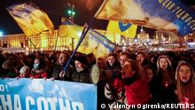 People attend a rally marking the 8th anniversary of the beginning of the Ukrainian pro-European Union (EU) mass demonstrations, in Kyiv, Ukraine November 21, 2021. REUTERS/Valentyn Ogirenko