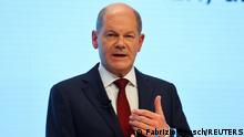 Social Democratic Party (SPD) top candidate for chancellor Olaf Scholz delivers a statement after a final round of coalition talks to form a new government, in Berlin, Germany, November 24, 2021. REUTERS/Fabrizio Bensch
