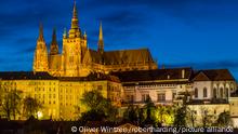 Illuminated Prague Castle and St. Vitus Cathedral seen from the banks of Vltava River, UNESCO World Heritage Site, Prague, Bohemia, Czech Republic, Europe