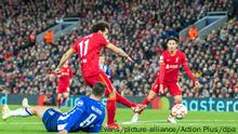 24th November 2021; Anfield, Liverpool, England; UEFA Champions League football, Liverpool versus FC Porto; Mohammed Salah of Liverpool shoots and scores for Liverpool for 2-0 in the 70th minute