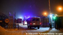 Rescuers conduct a search operation at the Listvyazhnaya coal mine in the Kemerovo region near the town of Belovo after an accident on November 25, 2021. - At least 11 miners died Thursday and dozens were missing following an accident that saw a Siberian coal mine filled with smoke, regional authorities said. (Photo by Alexander Patrin / AFP) (Photo by ALEXANDER PATRIN/AFP via Getty Images)