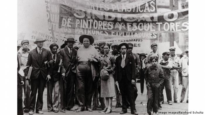 A photo from 1929 featuring Diego Rivera, Frida Kahlo and others at a May Day parade.