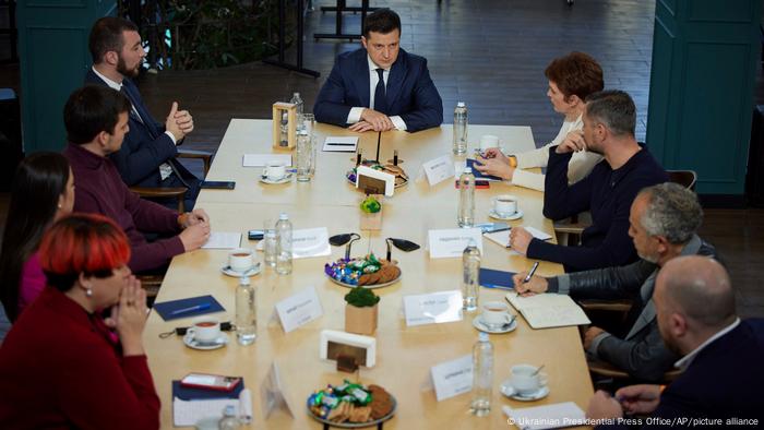 Ukrainian President Volodymyr Zelenskyy listens to media questions during a news conference in Kyiv, Ukraine, Friday, Nov. 26, 2021.