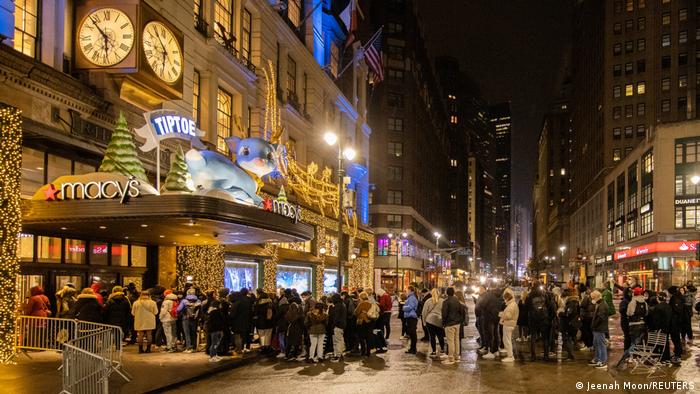 People wait in line at Macy's before Black Friday sales in the Manhattan borough of New York City