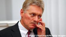 Kremlin spokesman Dmitry Peskov holds a mobile phone before a press conference of Russian President Vladimir Putin and Belarusian President Alexander Lukashenko at the Kremlin in Moscow on September 9, 2021. (Photo by SHAMIL ZHUMATOV / POOL / AFP) (Photo by SHAMIL ZHUMATOV/POOL/AFP via Getty Images)