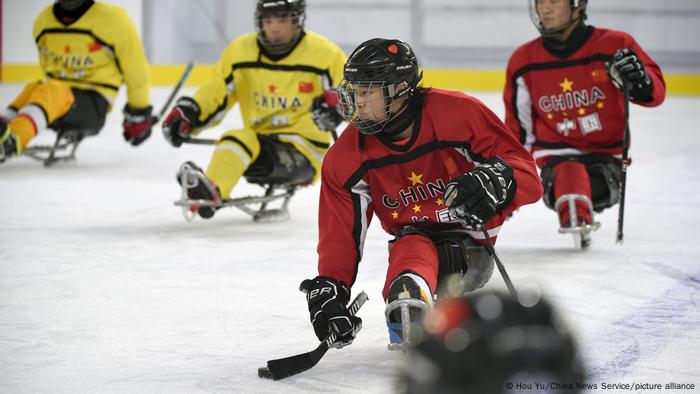 Chinese sledge hockey players at a training session