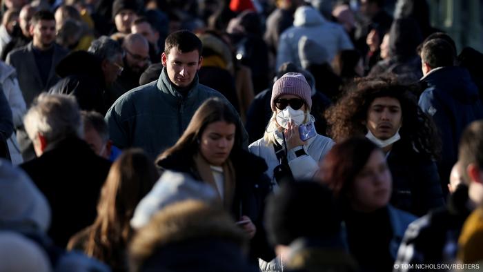 A crowd of people on the street in London