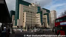 FILE - This Thursday, March 5, 2015 file photo shows a general view of the MI6 building in London. The head of Britain’s MI6 intelligence service, Richard Moore said in a video statement on Twitter, Friday Feb. 19, 2021, has apologized to gay spies and aspiring agents who were fired or denied jobs because of their sexuality. (AP Photo/Matt Dunham, File)