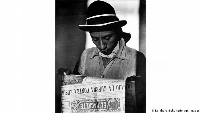 Famous Modotti image: A Mexican worker reading the newspaper El Machete.
