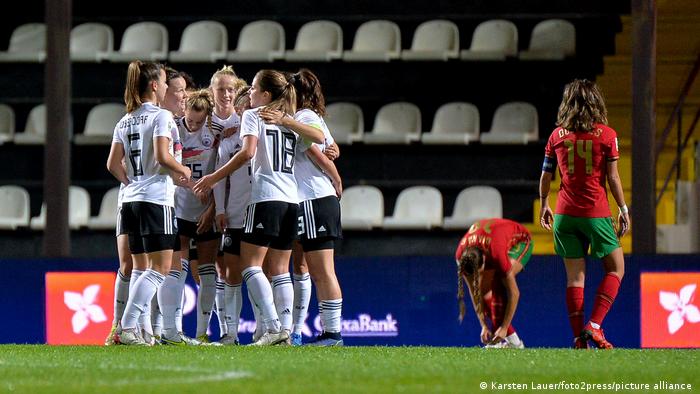 Germany's women's football team celebrate a goal against Portugal