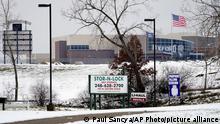 Oxford High School is shown in Oxford, Mich., Tuesday, Nov. 30, 2021, where authorities say a student opened fire at the school. (AP Photo/Paul Sancya)