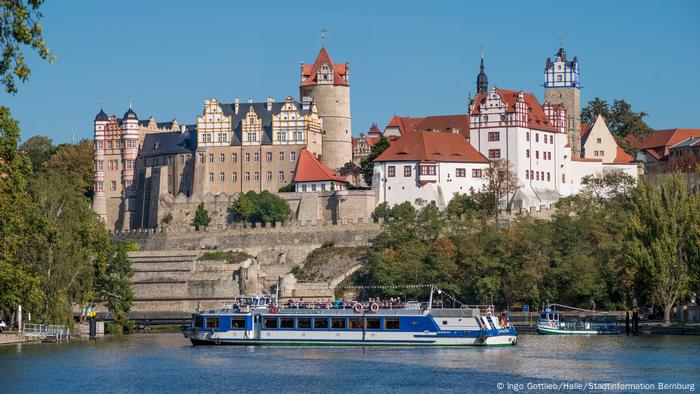 Bernburg castle with River Saale in the foreground