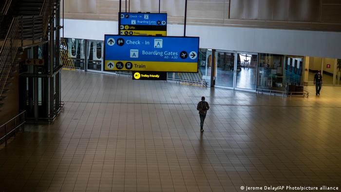 A man walks through a deserted part of Johannesburg's OR Tambo's airport