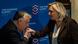 Viktor Orban kissing the hand of Marine Le Pen Viktor Orban kissing the hand of Marine Le Pen