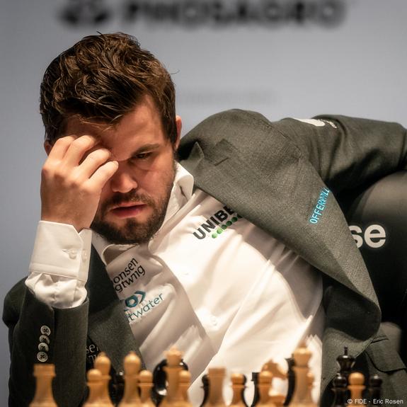 Magnus Carlsen realises he's blundered into checkmate!