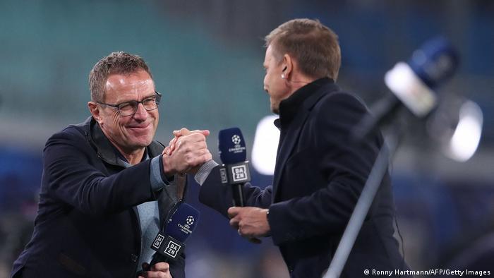 Jesse Marsch und Ralf Rangnick embrace before an RB Leipzig game against PSG