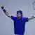 Российский теннисист Андрей Рублев празднует победу в Кубке Дэвиса