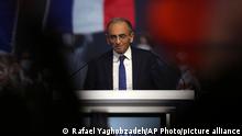 French far right presidential candidate Eric Zemmour speaks during his first rally, Sunday, Dec. 5, 2021 in Villepinte, north of Paris. Far-right former French TV pundit Eric Zemmour is holding his first campaign rally, a few days after he formally declared his candidacy for April's presidential election in a video relaying his anti-migrants, anti Islam views. A first round is to be held on April, 10, 2022 and should no candidate win a majority of the vote in the first round, a runoff will be held between the top two candidates on April 24, 2022. (AP Photo/Rafael Yaghobzadeh)