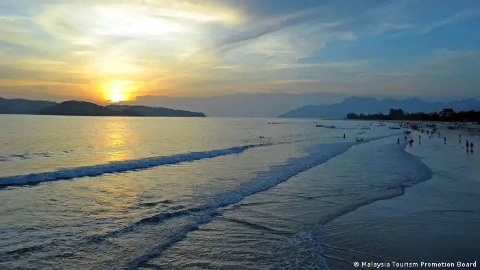 A photo of Cenang beach on the island of Langkawi at sunset.