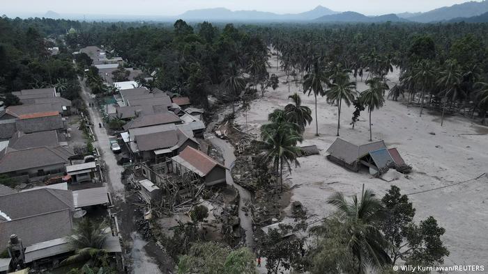An aerial view of damamged houses in Sumber Wuluh, Indonesia