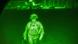 A photo of the last US soldier climbing the last US plane out of Kabul, taken with a nightvision filter A photo of the last US soldier climbing the last US plane out of Kabul, taken with a nightvision filter