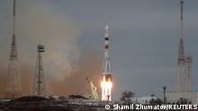 The Soyuz MS-20 spacecraft carrying Roscosmos cosmonaut Alexander Misurkin, space flight participant Japanese entrepreneur Yusaku Maezawa and his production assistant Yozo Hirano, blasts off to the International Space Station (ISS) at the Baikonur Cosmodrome, Kazakhstan, December 8, 2021. REUTERS/Shamil Zhumatov