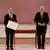 Olaf Scholz menerima sertifikat penugasan sebagai Kanselir Jerman dari presiden Frank-Walter Steinmeier