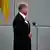 German Chancellor Olaf Scholz takes the oath from President of the Bundestag 