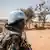 A Senegalese Blue Helmet peacekeeper in Mali. (Photo by AMAURY HAUCHARD / AFP)