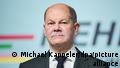What are the main tasks for Olaf Scholz and Germany's new government?