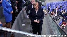Aktuell,08.12.2021 Berlin, Angela Merkel die Bundeskanzlerin der Bundesrepublik Deutschland auf der Ehrentribuene bei der Wahl des Bundeskanzlers bei der 5. Sitzung des Deutschen Bundestag in Berlin