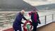Deborah Hucal and Sarah Hucal on the deck of a boat with a view of the Rhine river Deborah Hucal and Sarah Hucal on the deck of a boat with a view of the Rhine river