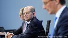 German Chancellor Olaf Scholz attends a news conference in the Federal Chancellery following the video conference with the country's 16 state leaders on the surge in the coronavirus disease (COVID-19) cases, in Berlin, Germany, December 9, 2021. Michael Kappeler/Pool via REUTERS