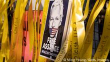 LONDON, ENGLAND - AUGUST 11: Supporters gather outside as the High Court hears a US appeal in the extradition of WikiLeaks founder Julian Assange, at Royal Courts of Justice, Chancery Lane on August 11, 2021 in London, England. Assange has been held in HMP Belmarsh since his conviction on May 1, 2019, for breaching bail conditions. Previously Judge Vanessa Baraitser denied his extradition to the United States citing him a suicide risk. He faces charges for hacking computers and violating the country's Espionage Act. The US is appealing the decision today. (Photo by Ming Yeung/Getty Images)