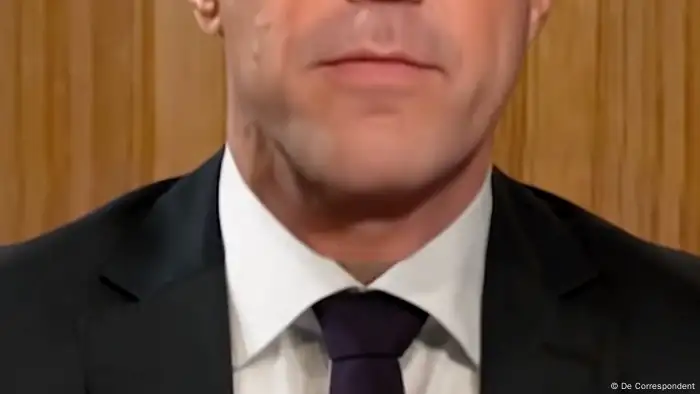 Mark Rutte's mouth and in a suit