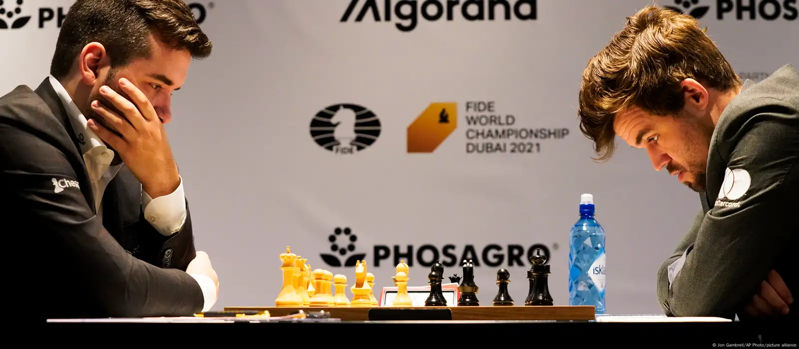 Carlsen and Nepomniachtchi draw chess world title opener after flag furore, World Chess Championship 2021