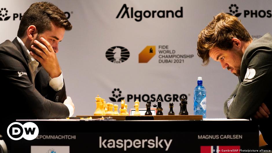 Magnus Carlsen wins 5th world chess title – DW – 12/10/2021