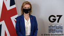 Britain's Foreign Secretary Liz Truss wearing a face covering to combat the spread of the coronavirus, poses for a photograph before a bilateral meeting with US Secretary of State Antony Blinken ahead of the G7 foreign ministers summit in Liverpool, north-west England on December 10, 2021. - Blinken arrived in Britain for a G7 ministers' meeting before visiting Indonesia, Malaysia and Thailand. (Photo by OLIVIER DOULIERY / POOL / AFP)