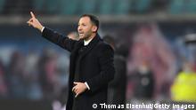LEIPZIG, GERMANY - DECEMBER 11: Domenico Tedesco, head coach of Leipzig gestures during his debut game as head coach during the Bundesliga match between RB Leipzig and Borussia Mönchengladbach at Red Bull Arena on December 11, 2021 in Leipzig, Germany. (Photo by Thomas Eisenhuth/Getty Images)