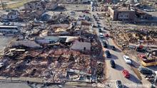 MAYFIELD, KENTUCKY - DECEMBER 11: In this aerial view, homes and businesses are destroyed after a tornado ripped through town the previous evening on December 11, 2021 in Mayfield, Kentucky. Multiple tornadoes touched down several Midwest states late evening December 11 causing widespread destruction and leaving an estimated 70-plus people dead. (Photo by Scott Olson/Getty Images)