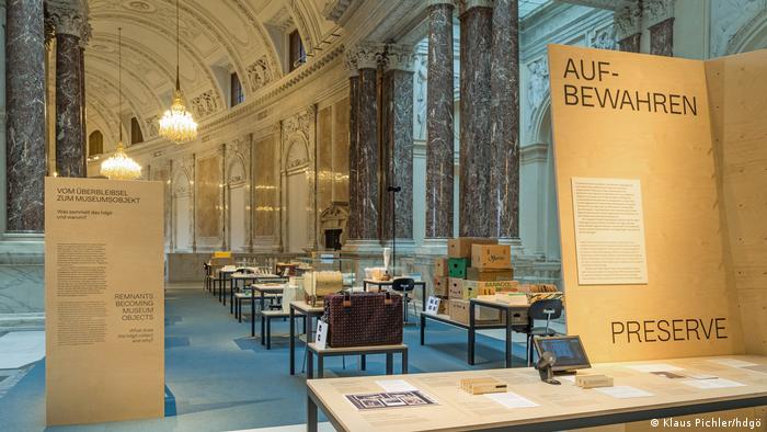 Exhibits in the Museum of Austrian History, including tables and posters