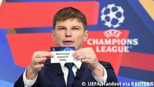 Soccer Football - Champions League - Round of 16 Draw - Nyon, Switzerland - December 13, 2021
Andrey Arshavin draws out the card of Manchester United during the UEFA Champions League 2021/22 Round of 16 Draw at the UEFA headquarters
UEFA/Handout via REUTERS
ATTENTION EDITORS - THIS IMAGE HAS BEEN SUPPLIED BY A THIRD PARTY. NO RESALES. NO ARCHIVES
