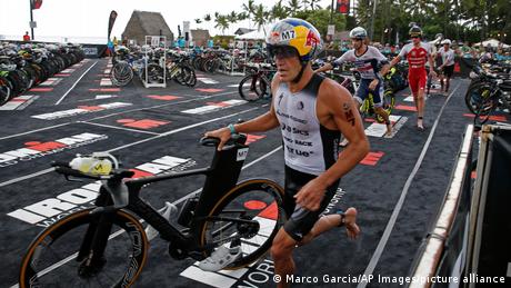 Braden Currie of about to mount his bicycle