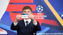 Soccer Football - Champions League - Round of 16 Draw - Nyon, Switzerland - December 13, 2021
Andrey Arshavin draws out the card of Bayern Munich during the UEFA Champions League 2021/22 Round of 16 Draw at the UEFA headquarters
UEFA/Handout via REUTERS
ATTENTION EDITORS - THIS IMAGE HAS BEEN SUPPLIED BY A THIRD PARTY. NO RESALES. NO ARCHIVES
