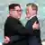 Kim Jong Un gives Moon Jae-in a hug